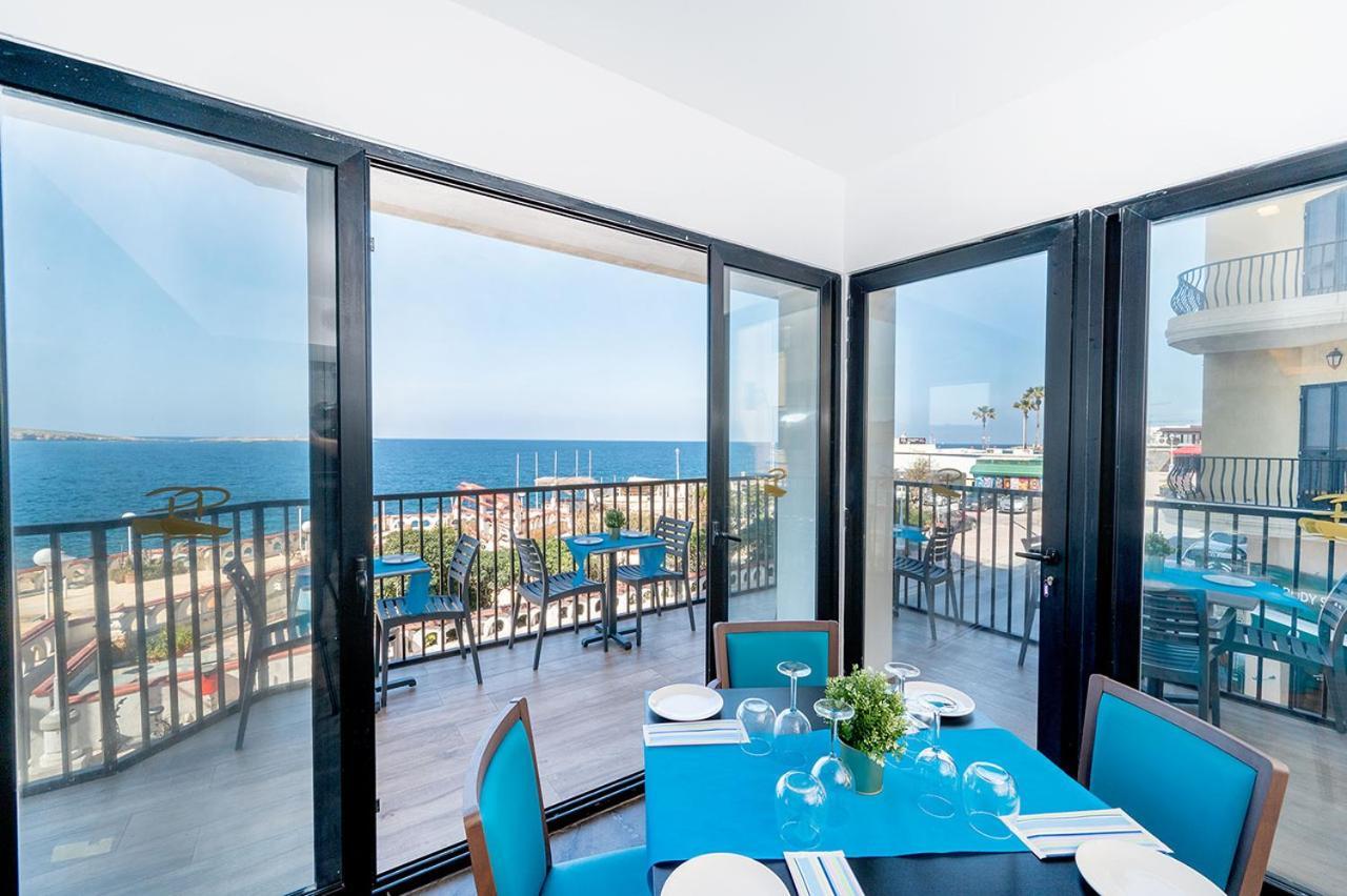 Islet Promenade Seafront Apartment With Large Corner Terrace By Getawaysmalta St. Paul's Bay Buitenkant foto